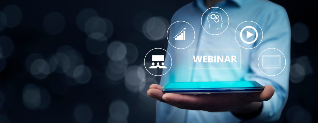 Webinar With Man Holding A Tablet